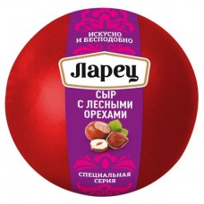 Сыр полутвердый Ларец с лесными орехами 50% БЗМЖ, вес (kastd) в магазинах Ашан