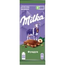 Шоколад Milka молочный с дробленным фундуком, 90 г в магазинах Дикси