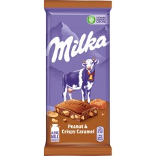 Шоколад молочный MILKA с арахисом, кусочками хрустящей карамели, рисовыми шариками и кукурузными хлопьями, 90г в магазинах Лента