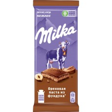 Шоколад молочный MILKA с дробленым орехом, пастой из фундука и с дробленым фундуком, 85г в магазинах Лента