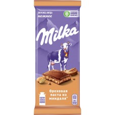 Шоколад молочный MILKA с добавлением ореховой пасты и с дробленым карамелизированным миндалем, 85г в магазинах Лента