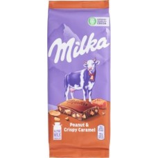 Шоколад Milka Молочный с арахисом и кусочками хрустящей карамели 90г в магазинах Магнит