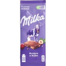 Шоколад Milka молочный с фундуком и изюмом 85г в магазинах Магнит