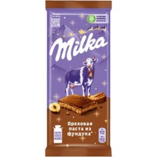 Шоколад Milka Молочный с начинкой ореховой пасты из фундука и с дробленым фундуком 85г в магазинах Магнит